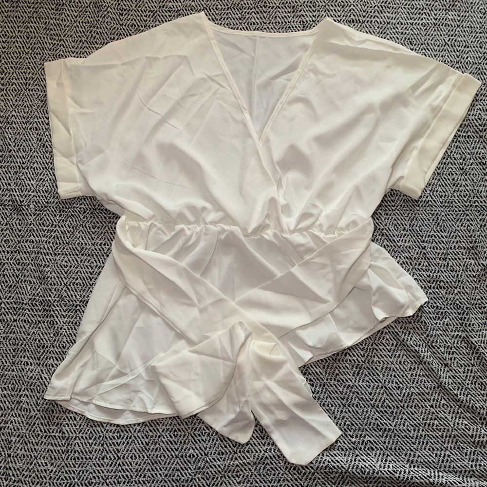White Asymmetrical Hem Blouse